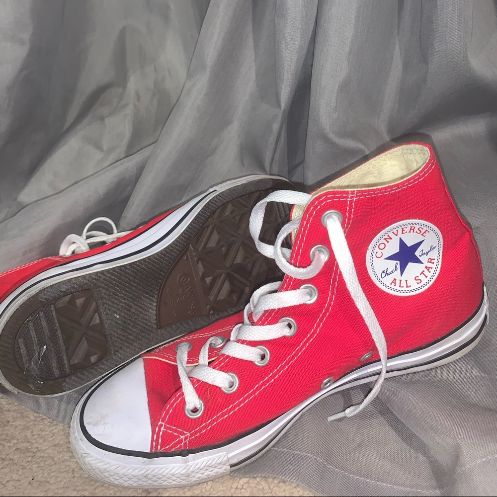 Red high top converse shoes